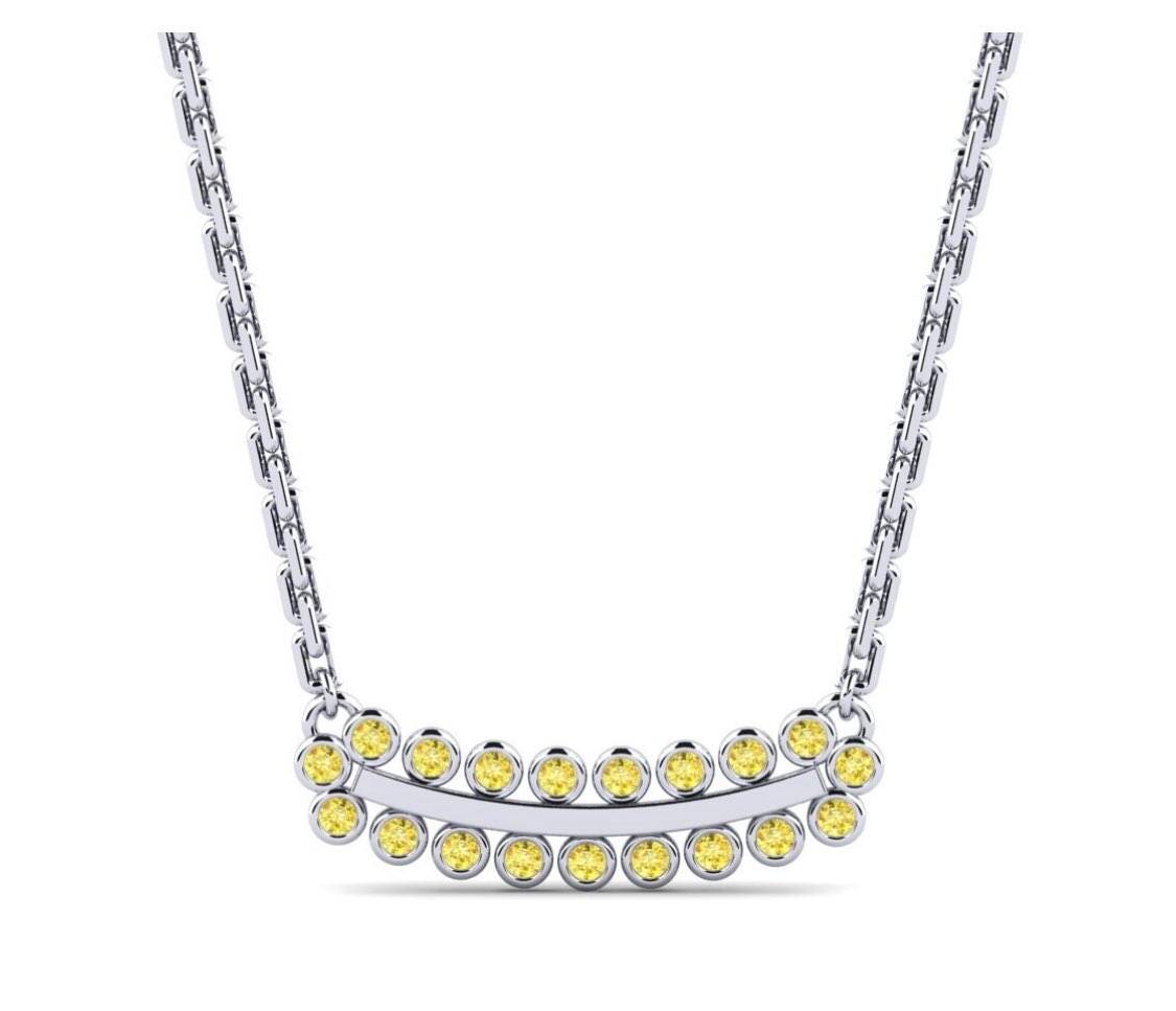 Beautiful white gold necklace  19 yellow canary diamonds .18 ct